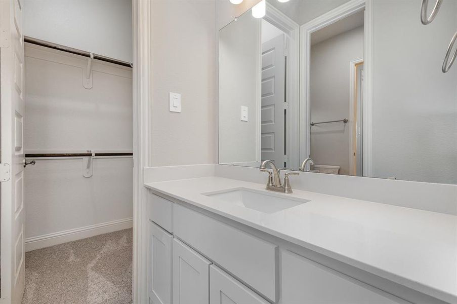 Bathroom featuring vanity