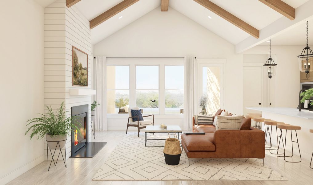 Great room with stained ceiling beams and fireplace Great room with stained ceiling beams and fireplace