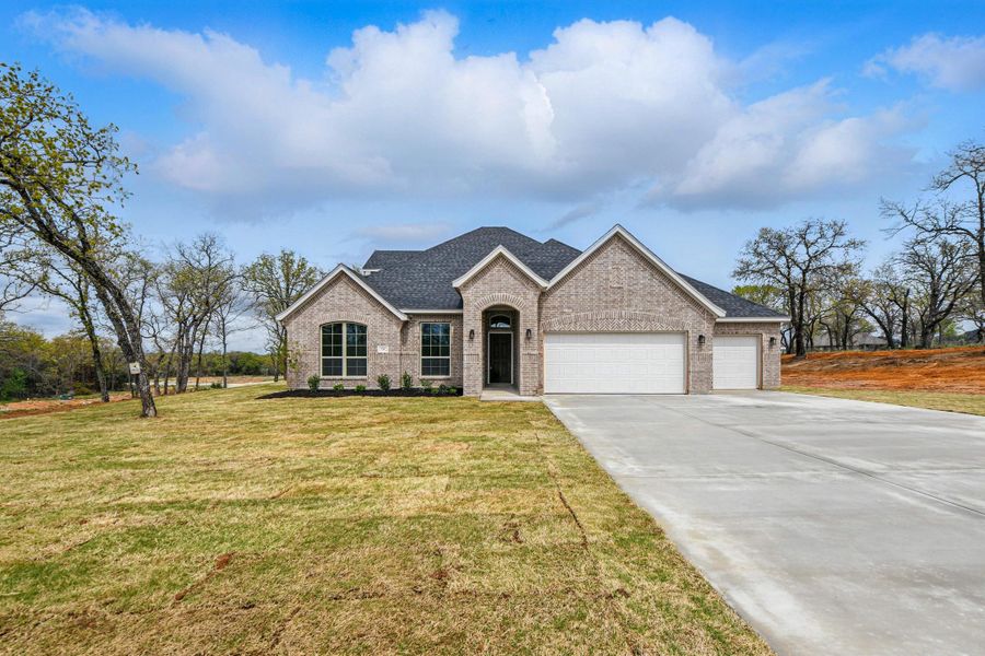 Representative exterior photo of a completed home built from the McKinley II by Cheldan Homes in Terra Vista Estates, Springtown, TX (Image 21).