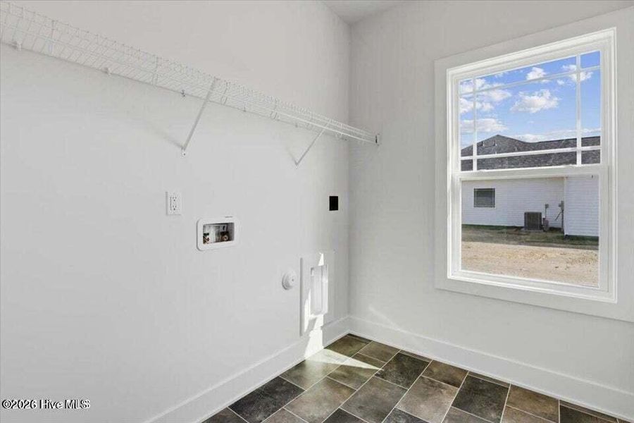 Spacious, unfurnished interior of a new home in Wood Creek Landing, Leland (Image 28). Spacious, unfurnished interior of a new home in Wood Creek Landing, Leland (Image 28).