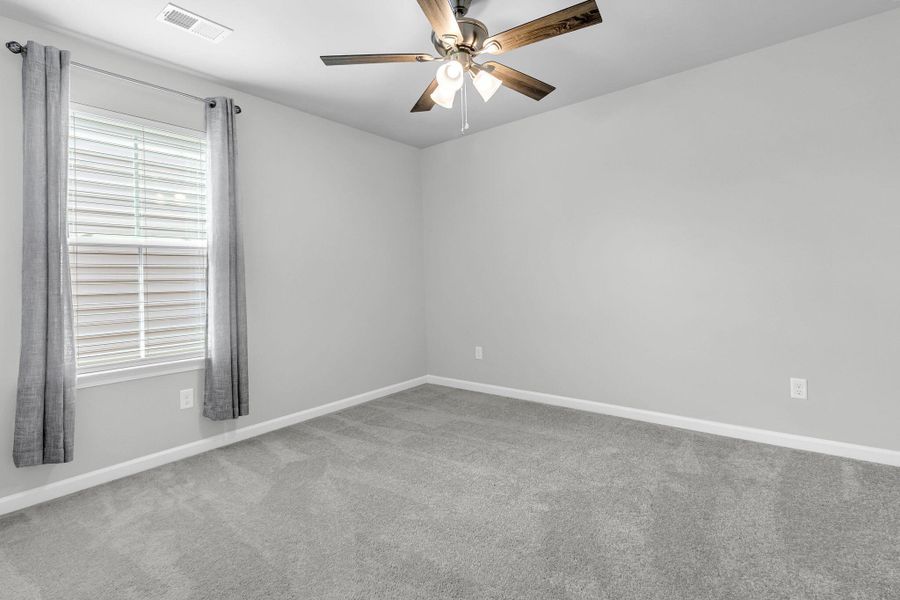 Spacious, unfurnished interior of a new home in Sweetgrass at Summers Corner, Summerville (Image 20).
