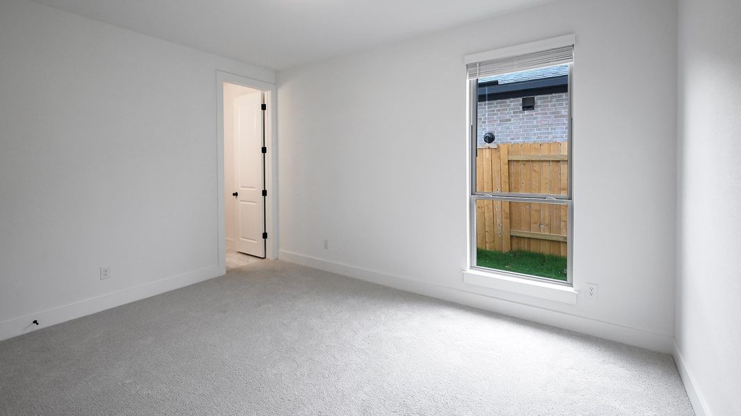 Spacious, unfurnished interior of a new home in 6 Creeks, Kyle (Image 16).