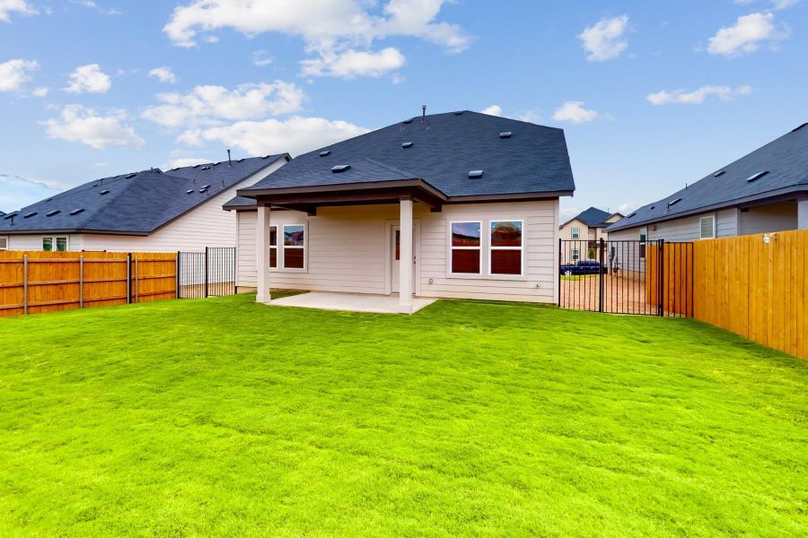 Front exterior of a new home in Cascades at Onion Creek, Austin, TX, highlighting curb appeal (Image 15). Front exterior of a new home in Cascades at Onion Creek, Austin, TX, highlighting curb appeal (Image 15).