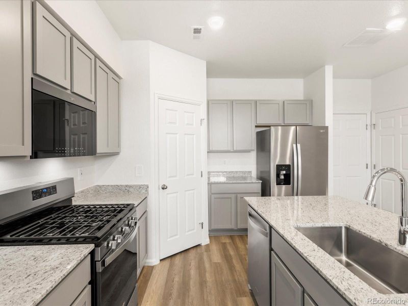 Furnished interior view inside a new home in Poudre Heights: The Meadow Collection, Windsor (Image 5).