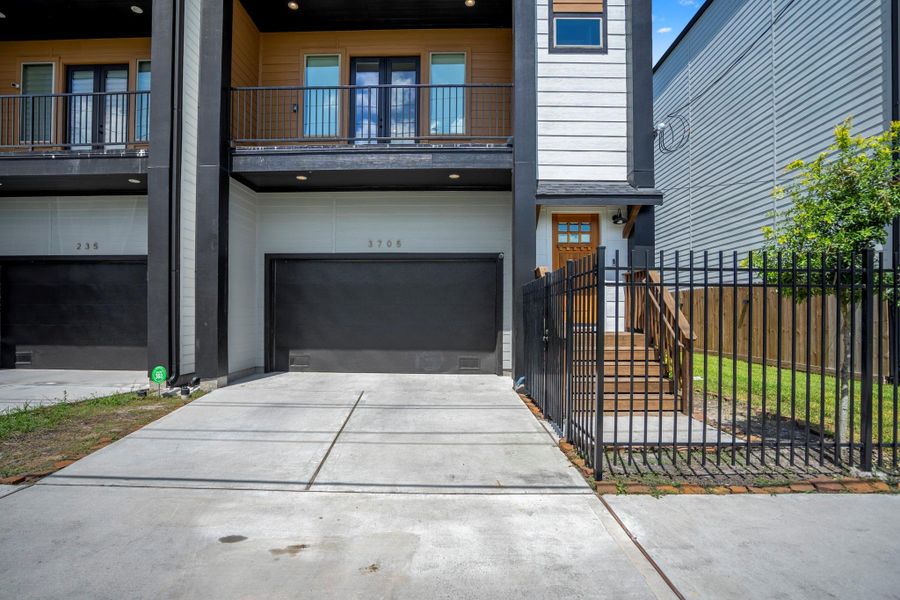 Constructed in 2023, this home boasts a double-width driveway, an automated garage door, and a fully fenced yard for privacy.