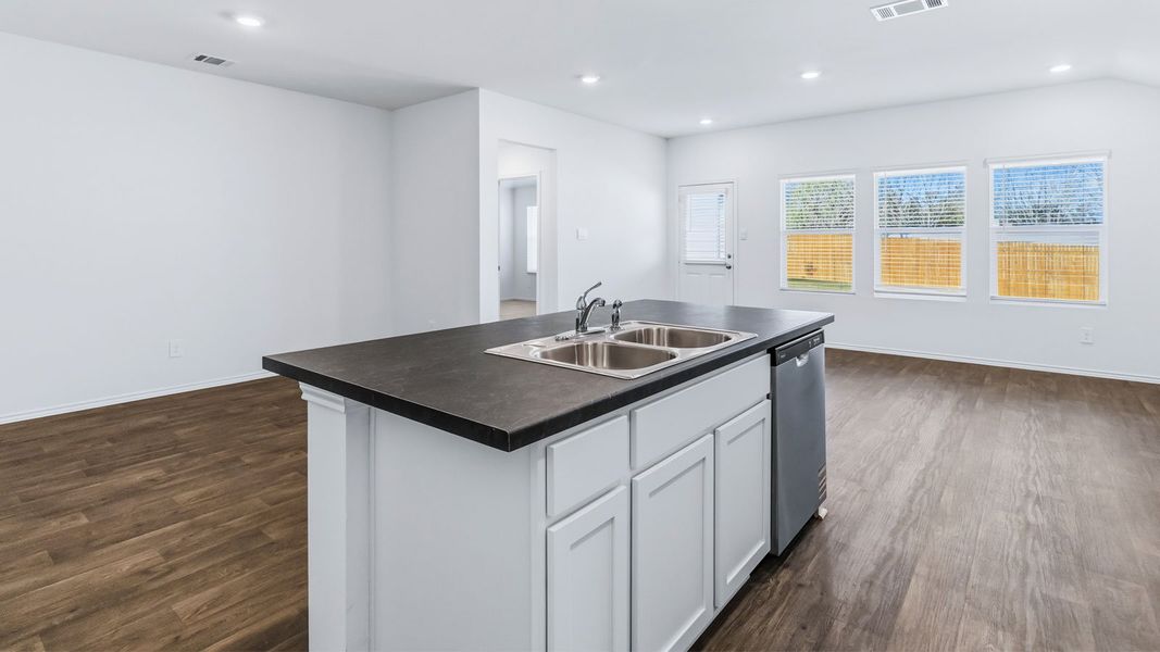 Representative furnished interior of a home built from the The Easton by D.R. Horton in Wayside, Uhland (Image 8).