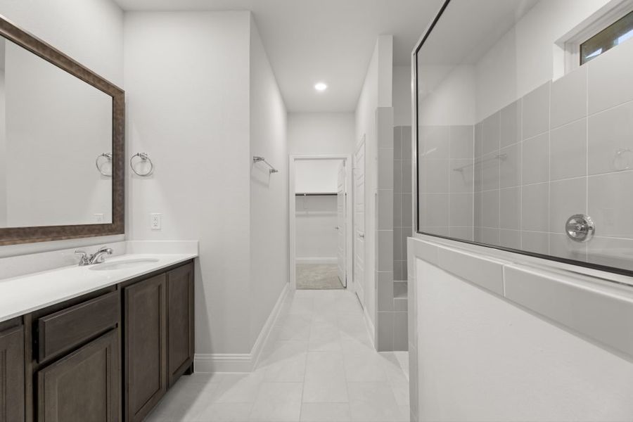 Front exterior of a new home in Redden Farms – Active Adult, Midlothian, TX, highlighting curb appeal (Image 25).