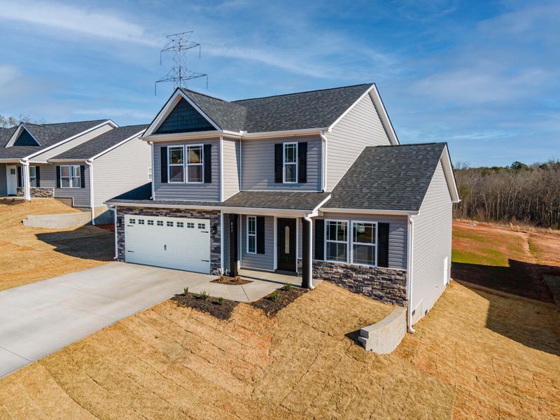 Representative exterior photo of a completed home built from the Sumter by Enchanted Homes in Ballentine Ridge, Lyman, SC (Image 27).