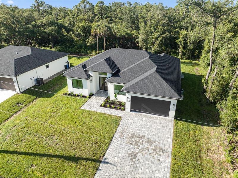 Front exterior of a new home in , Port Charlotte, FL, highlighting curb appeal (Image 32). Front exterior of a new home in , Port Charlotte, FL, highlighting curb appeal (Image 32).