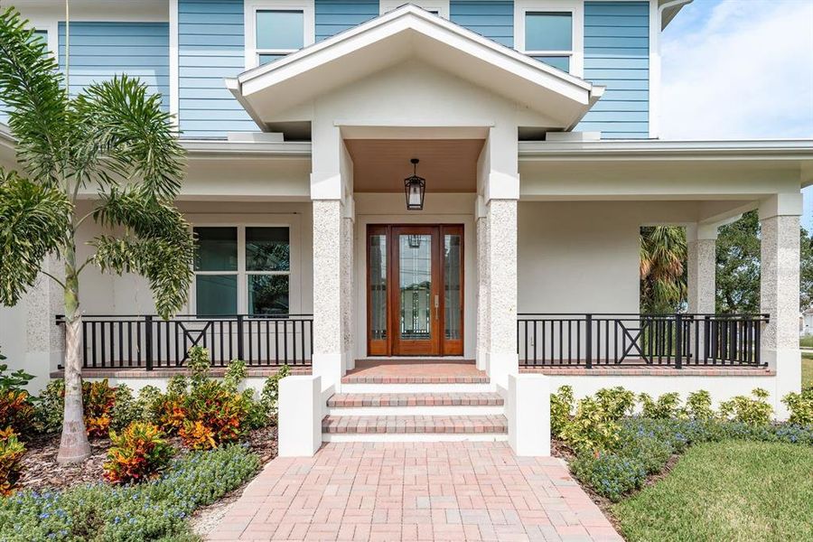 Front exterior of a new home in , Tarpon Springs, FL, highlighting curb appeal (Image 21).