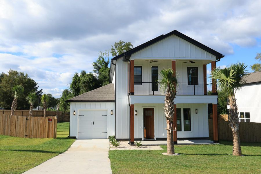 Front exterior of a new home in , North Charleston, SC, highlighting curb appeal (Image 2).