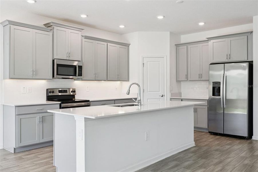 Furnished interior view inside a new home in Pine Glen: Chateau Collection, St. Cloud (Image 6).
