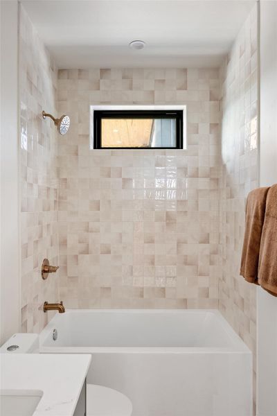 Full bath with tub / shower combination and vanity Full bath with tub / shower combination and vanity