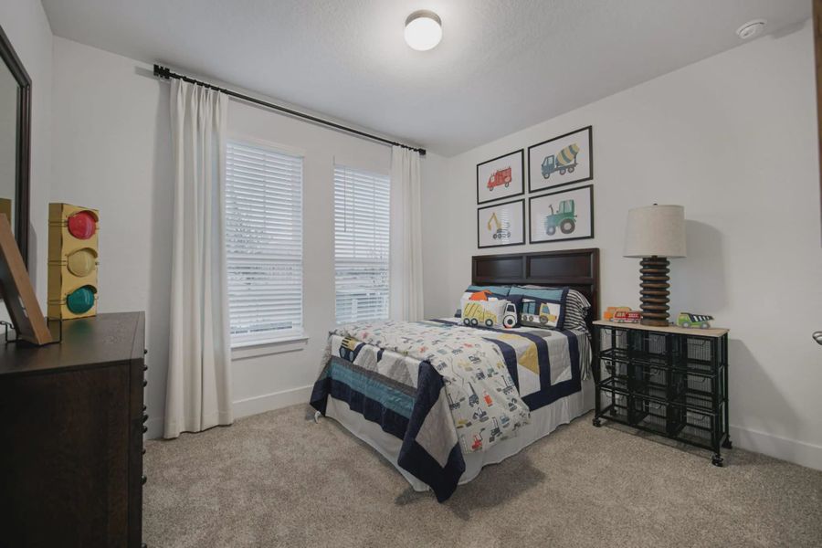 Representative furnished interior of a home built from the Barron by Chesmar Homes in Lariat, Liberty Hill (Image 9).