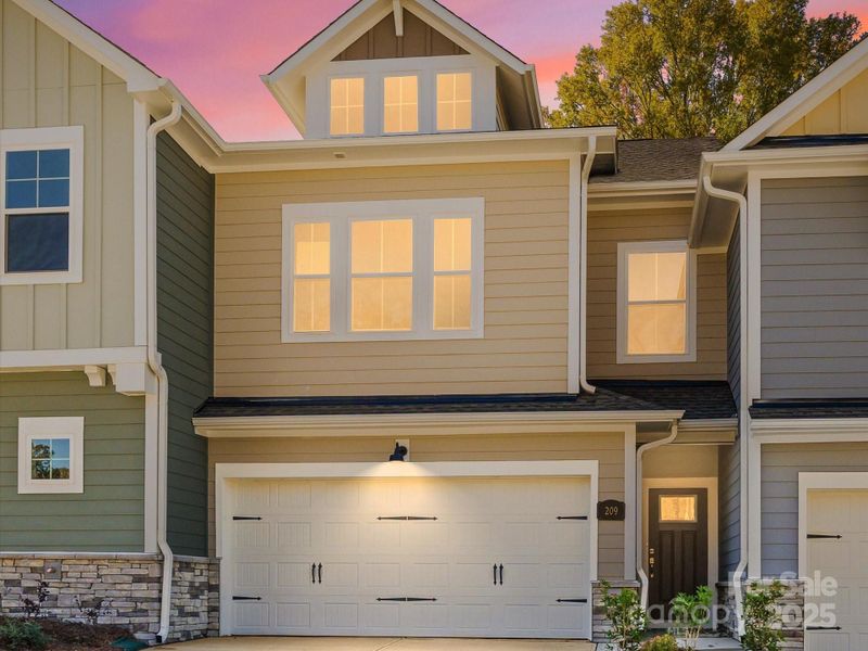 Front exterior of a new home in Westview Towns, Waxhaw, NC, highlighting curb appeal (Image 2). Front exterior of a new home in Westview Towns, Waxhaw, NC, highlighting curb appeal (Image 2).