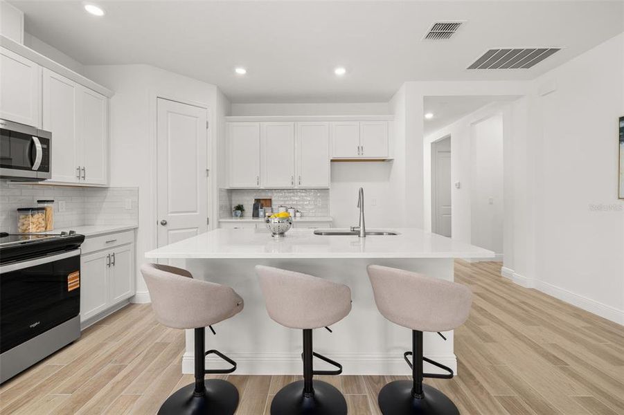 Furnished interior view inside a new home in Green Key Village, Lady Lake (Image 3).