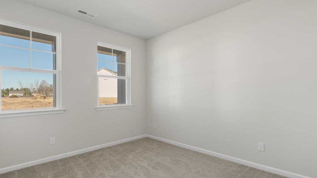 Spacious, unfurnished interior of a new home in Indigo Preserve, Leland (Image 26).