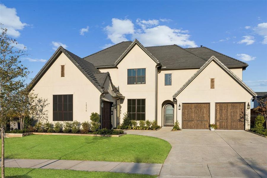 Front exterior of a new home in , Frisco, TX, highlighting curb appeal (Image 1).