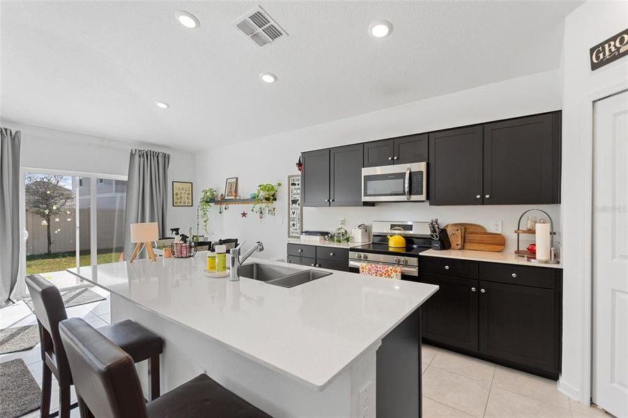 Furnished interior view inside a new home in Lawson Dunes: Estate Collection, Haines City (Image 19).