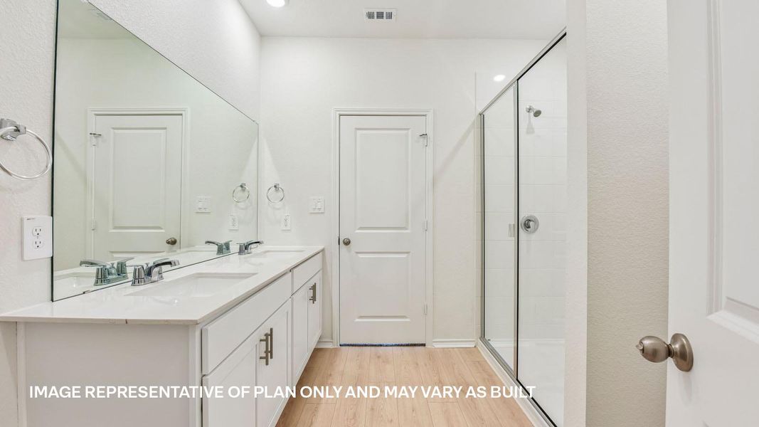 Representative furnished interior of a home built from the The Travis by D.R. Horton in Valverde, Bastrop (Image 14).