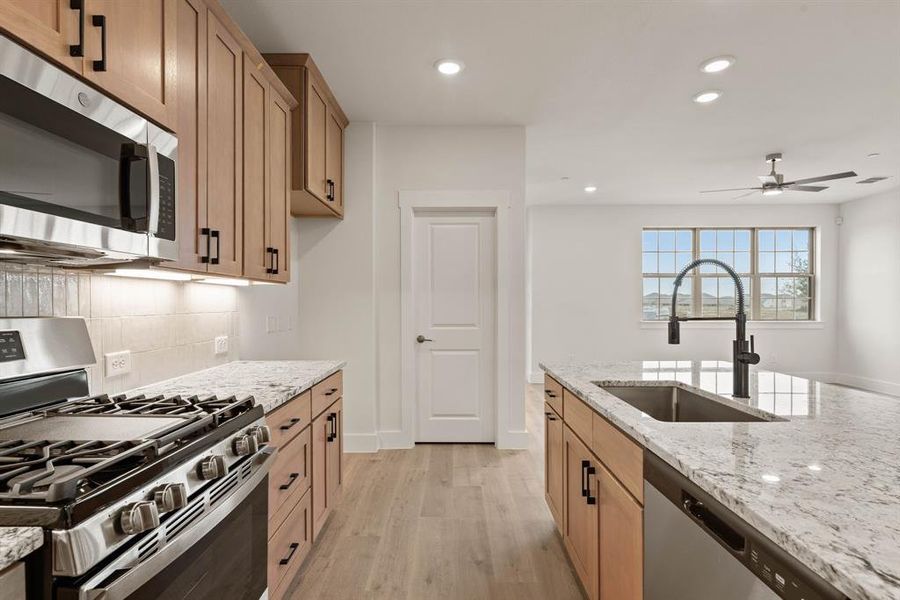 Thoughtful design elements like pot & pan drawers, pull out trash drawer and walk in pantry can be found in this dream kitchen! Thoughtful design elements like pot & pan drawers, pull out trash drawer and walk in pantry can be found in this dream kitchen!