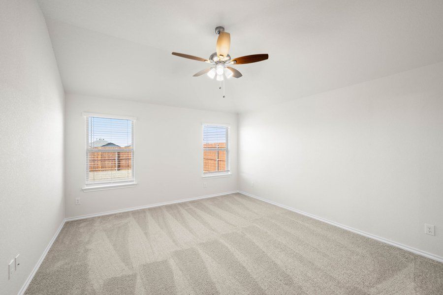 Representative exterior photo of a completed home built from the Cheyenne by Impression Homes in ValleyBrooke, Mesquite, TX (Image 18).