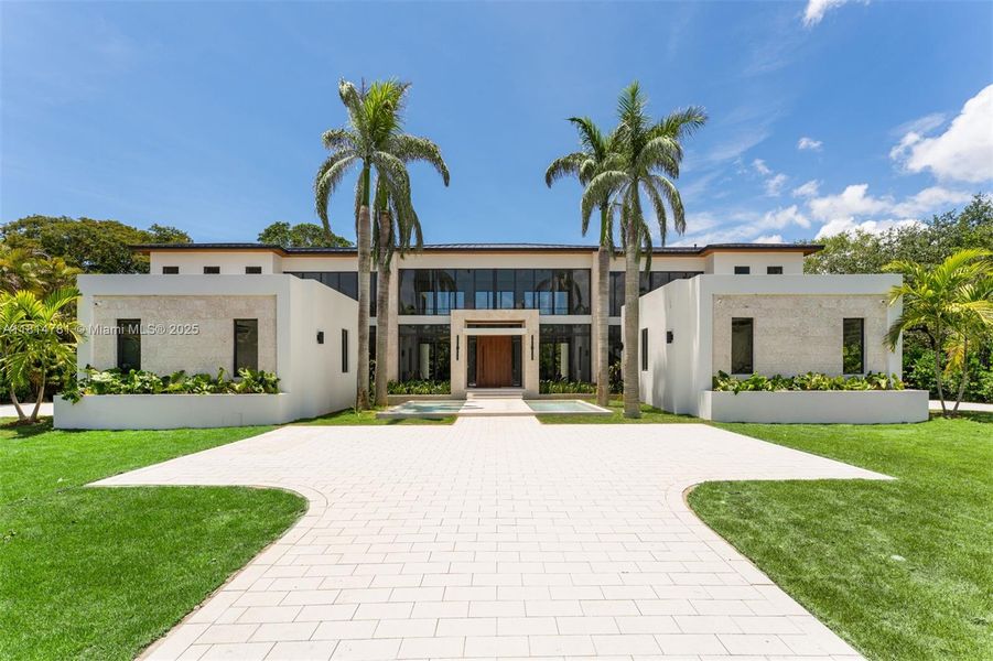 Front exterior of a new home in , Pinecrest, FL, highlighting curb appeal (Image 37).