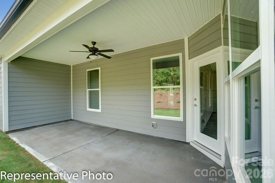 Covered porch at rear of home Covered porch at rear of home