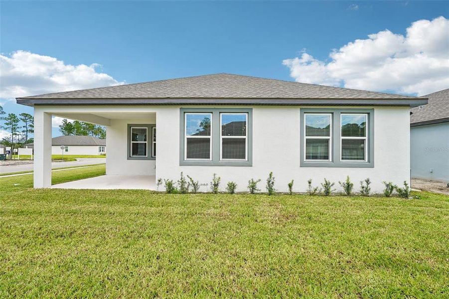 Exterior details and patio area of a home in Legends Preserve - Signature Series, Daytona Beach (Image 27).