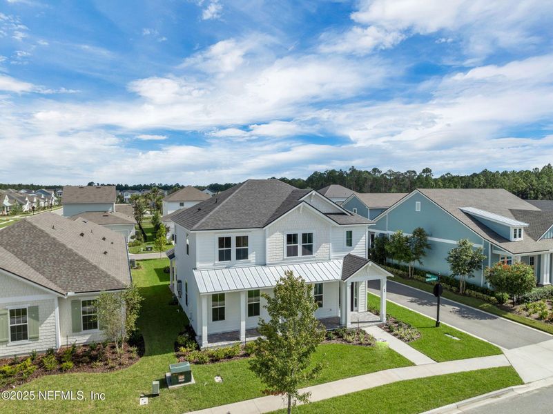 Front exterior of a new home in Seabrook Village at Seabrook, Nocatee, FL, highlighting curb appeal (Image 23). Front exterior of a new home in Seabrook Village at Seabrook, Nocatee, FL, highlighting curb appeal (Image 23).