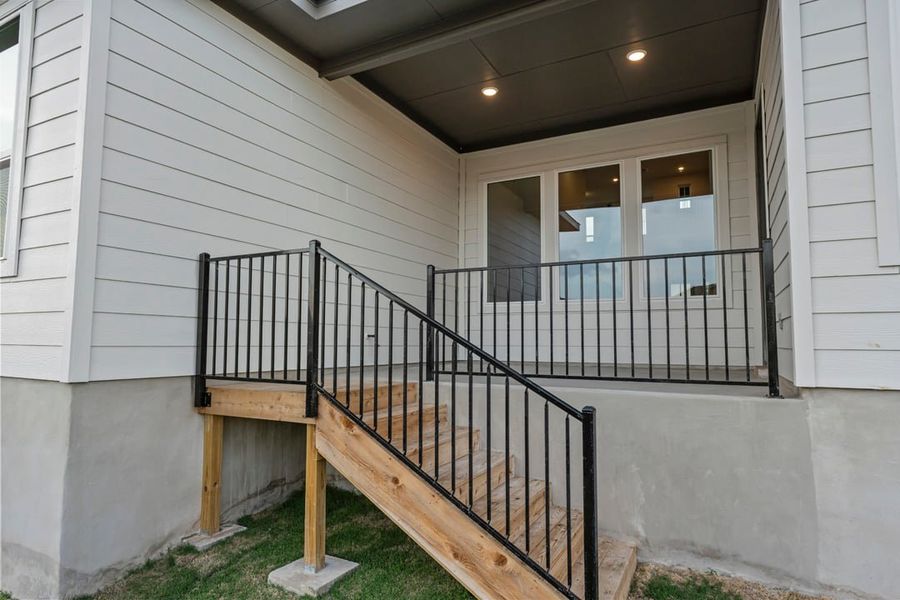 Exterior details and patio area of a home in Park Collection at Lariat, Liberty Hill (Image 30). Exterior details and patio area of a home in Park Collection at Lariat, Liberty Hill (Image 30).
