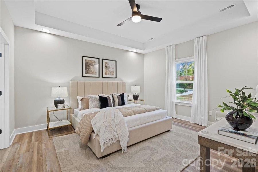 Photo of nearly identical home so you can see the space with furniture.