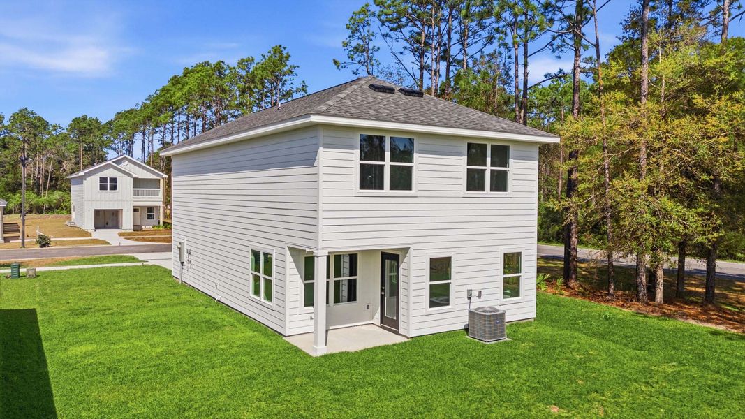 Exterior details and patio area of a home in Chateau Nemours, Port Saint Joe (Image 4).
