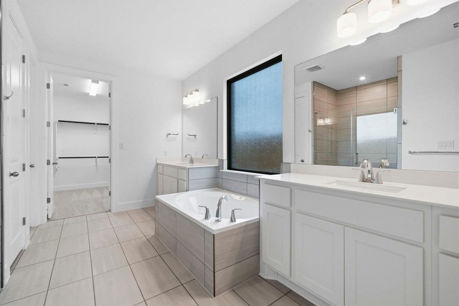 Primary Bath retreat with dual vanities & garden tub