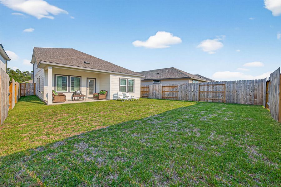 Exterior details and patio area of a home in Mavera, Conroe (Image 3). Exterior details and patio area of a home in Mavera, Conroe (Image 3).