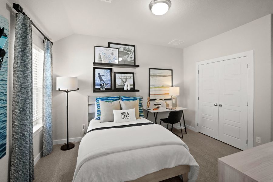 Bedroom in the Lakeside at Tessera Willow model home in Lago Vista TX by Trophy Signature Homes