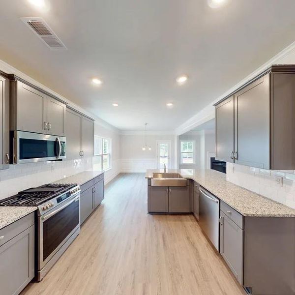 Furnished interior view inside a new home in Mirror Lake at South Harbour, Villa Rica (Image 4).