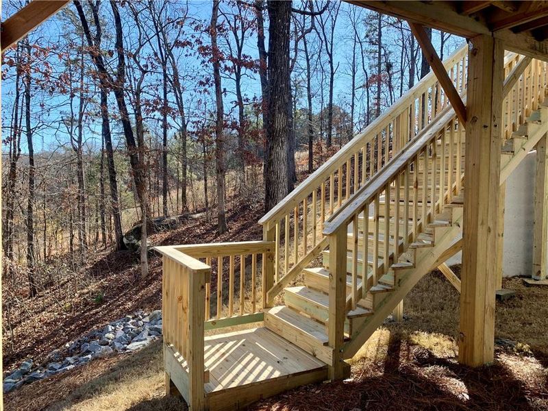 Exterior details and patio area of a home in Reunion, Hoschton (Image 25).