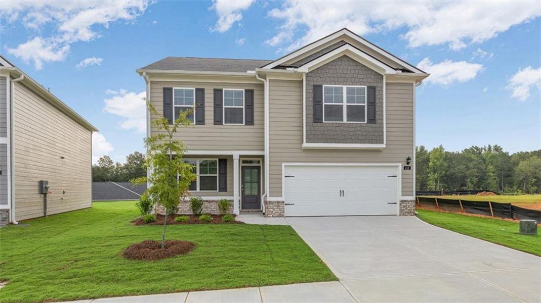 Front exterior of a new home in Kingston Ranch at Lake Oconee, Buckhead, GA, highlighting curb appeal (Image 1). Front exterior of a new home in Kingston Ranch at Lake Oconee, Buckhead, GA, highlighting curb appeal (Image 1).