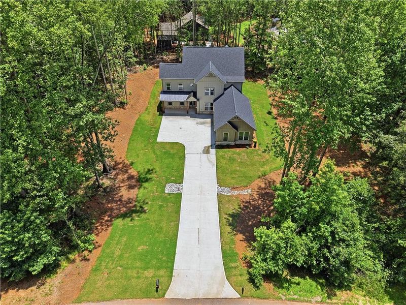 Front exterior of a new home in , Pendergrass, GA, highlighting curb appeal (Image 29). Front exterior of a new home in , Pendergrass, GA, highlighting curb appeal (Image 29).