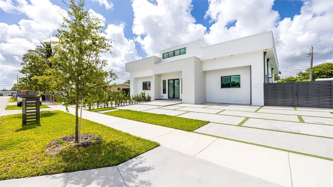 Front exterior of a new home in , Miami, FL, highlighting curb appeal (Image 25).
