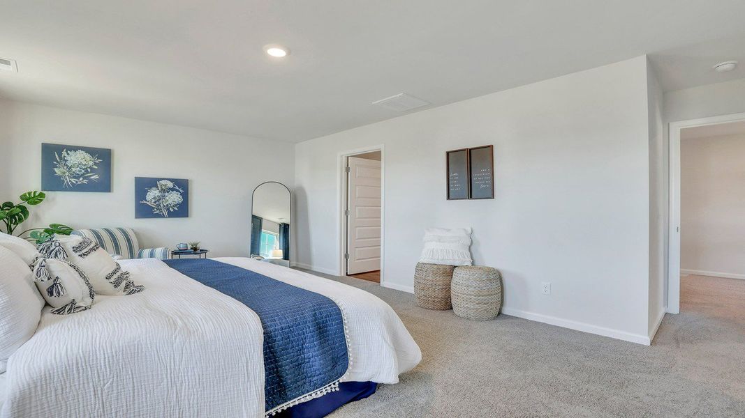 Representative furnished interior of a home built from the ROBIE by D.R. Horton in Longleaf Village, Rincon (Image 25).