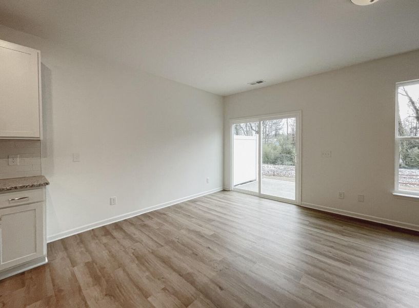 Spacious, unfurnished interior of a new home in East Main Townes, Spartanburg (Image 18).