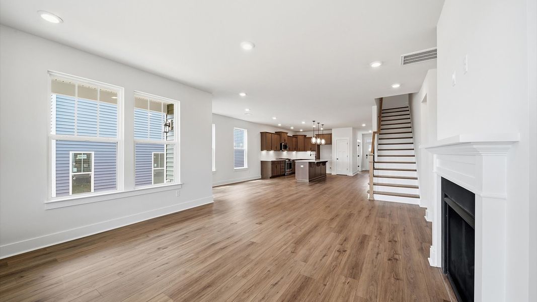 Accomplished layout centers around a spacious family room with exceptional flow and flexibility