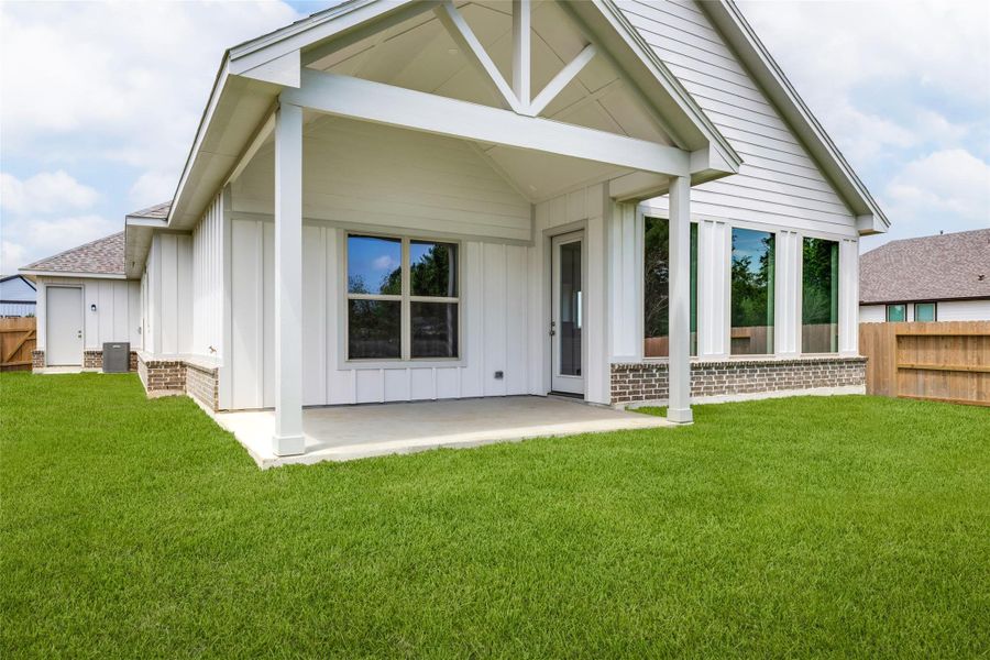 Exterior details and patio area of a home in , Sealy (Image 3).