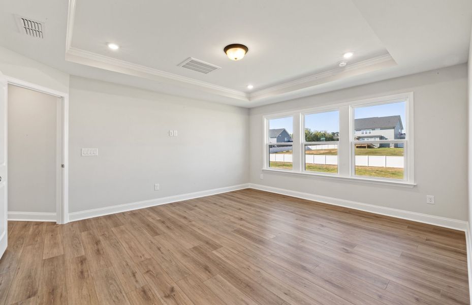 Spacious, unfurnished interior of a new home in Browning Stables, Wendell (Image 25).