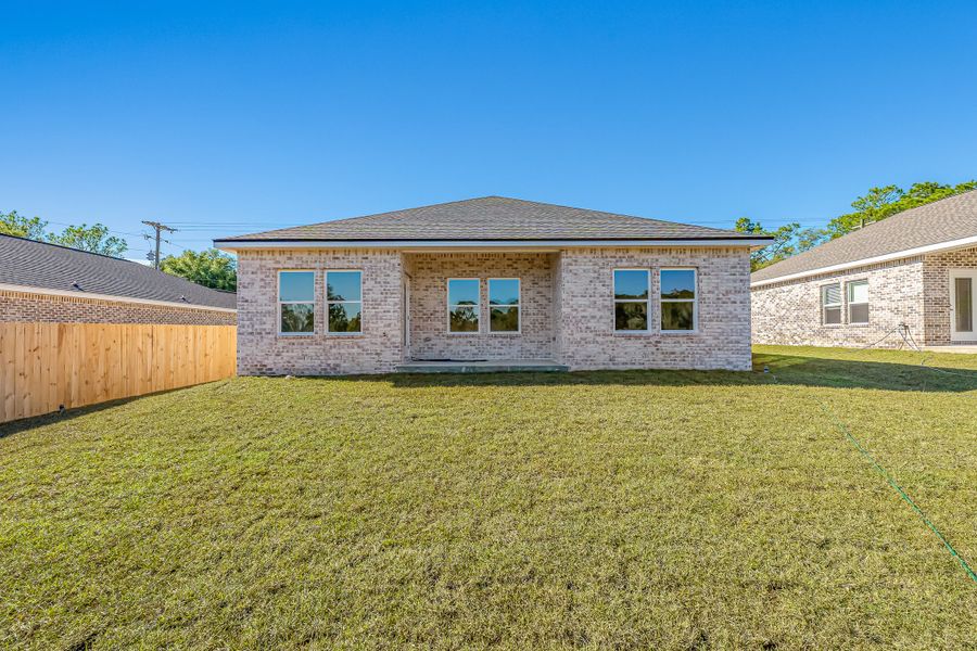 Exterior details and patio area of a home in Blossom Grove, Crestview (Image 23).