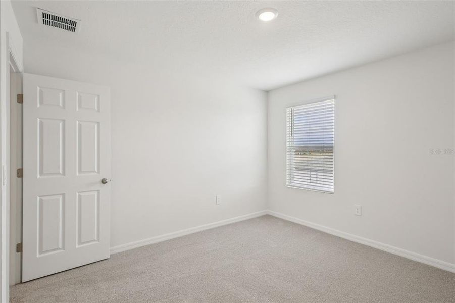 Spacious, unfurnished interior of a new home in Springs at Lake Alfred - Classic Series, Lake Alfred (Image 23).