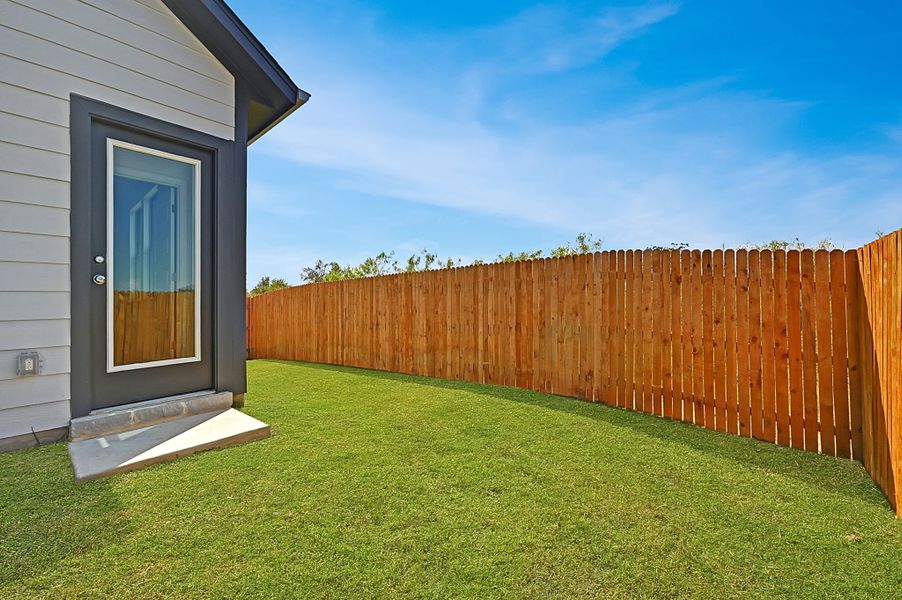 Exterior details and patio area of a home in Trinity Ranch, Elgin (Image 4).