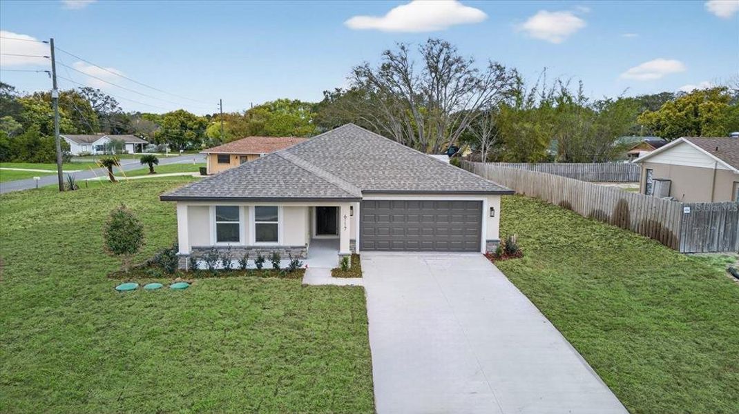 Front exterior of a new home in , Spring Hill, FL, highlighting curb appeal (Image 20). Front exterior of a new home in , Spring Hill, FL, highlighting curb appeal (Image 20).